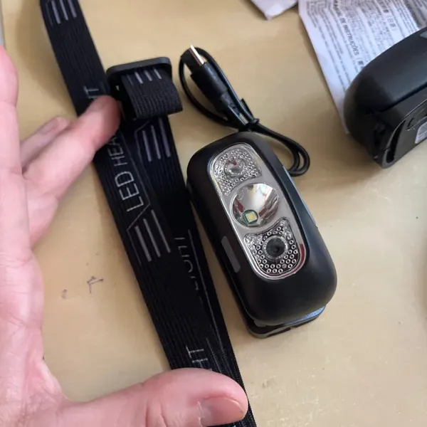 LumenTrail headlamp with USB-C cable, photo by verified buyer Danielle K.